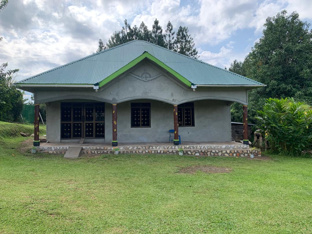 The main house for homestay and terrace for your luggage if pitching a tent